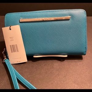 Gorgeous teal Steve Madden wallet with removable wristlet strap!